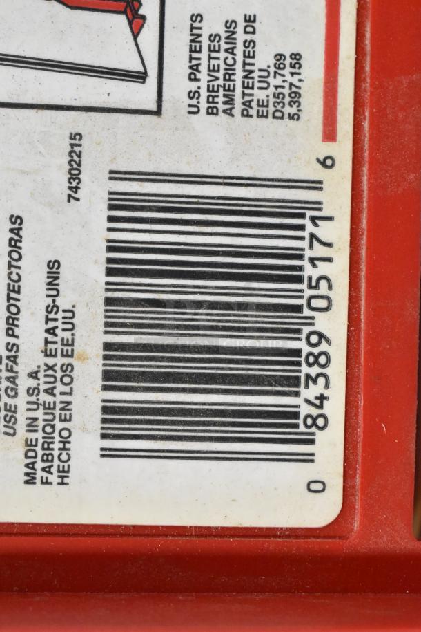 Barcode label on a red item, indicating "Made in U.S.A." with patent numbers. Part of a variety item lot.