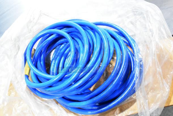 Coiled blue hose, part of ALL ONE MONEY! tier lot including Goldblatt panel carry and giant wall storage hangers.