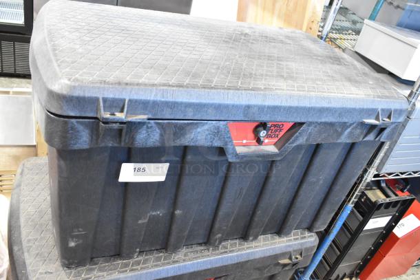 Pro Tuff Box Tool Box, black, durable plastic, contents include towels, features secure latching, minor surface wear.