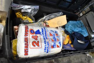 Pro Tuff Box tool box with detailing towels, assorted tools, and accessories. Features secure latches and spacious interior.