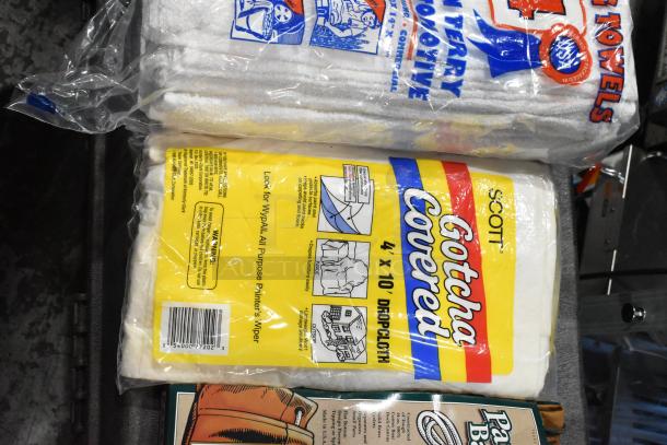 Pro Tuff Box Tool Box with contents including rolls of Scott Gotcha Covered 4x10 drop cloths and terry towels, all in new condition.