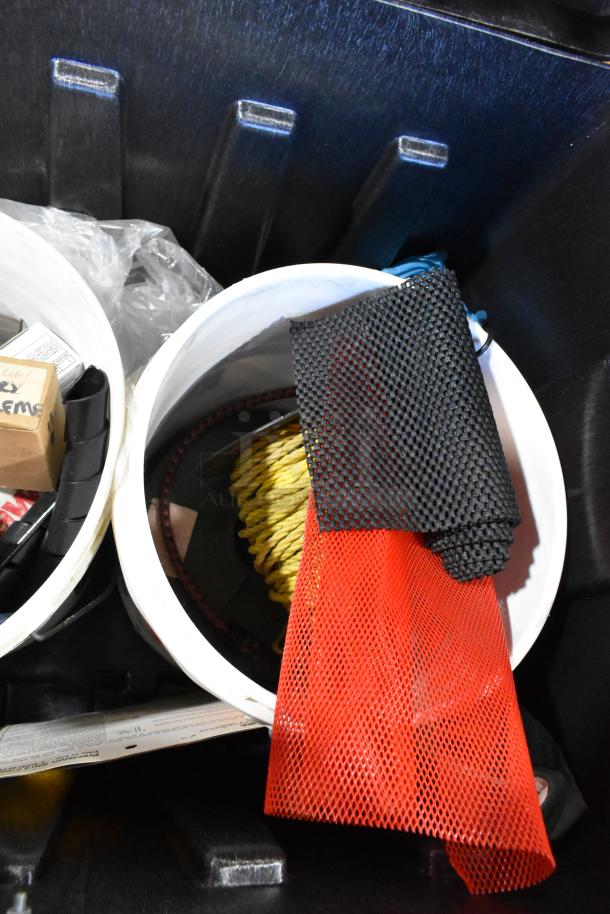 Pro Tuff Box toolbox containing various items including towels, ropes, and containers. Sturdy condition, ideal for storage.