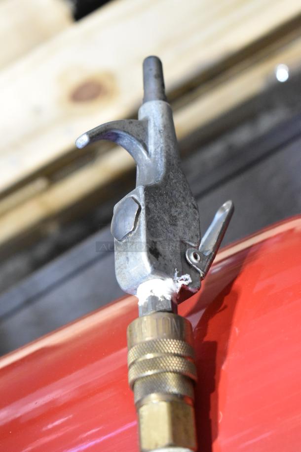 Close-up of Craftsman 919-15209 air compressor nozzle, showing metal construction and brass fittings. Condition appears used.