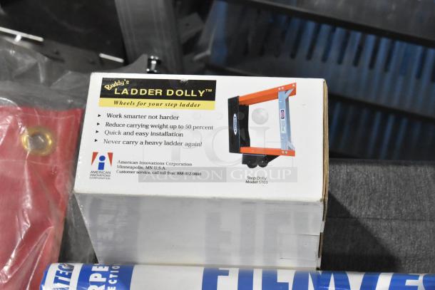 Trunk with fire blanket and Buddy's Ladder Dolly in original packaging, model ST03 by American Innovations Corporation.