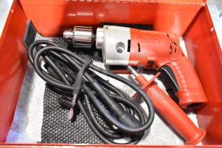 Milwaukee Electric Holeshooter in red metal tool box, includes power cord and side handle, excellent condition.