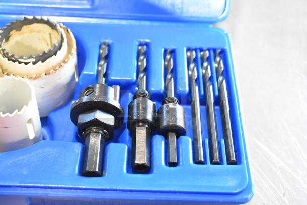 Hole saw kit with multiple drill bits and arbor, in a blue plastic case, included in 2 various poly bins of contents.