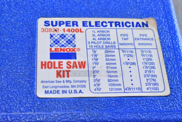 Lenox Hole Saw Kit label on a poly bin, includes arbors, pilot drills, and hole saw sizes. Made in U.S.A, good condition.
