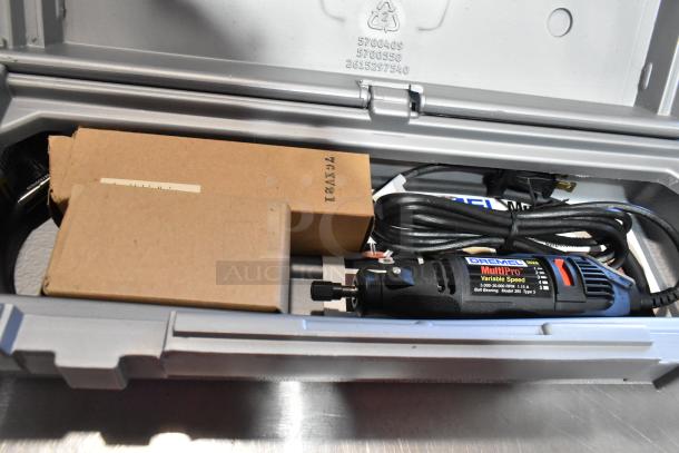 Dremel MultiPro Variable Speed Electric Drill in gray case, includes power cord and accessories in cardboard boxes, model 395.