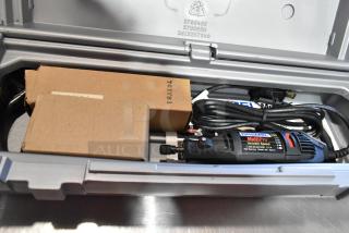 Dremel MultiPro Variable Speed Electric Drill in gray case, includes power cord and accessories in cardboard boxes, model 395.