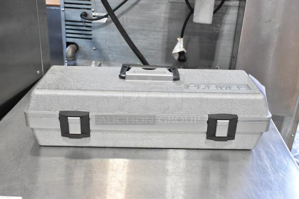 Dremel MultiPro Variable Speed Electric Drill in gray plastic case with black latches and handle, embossed logo visible.