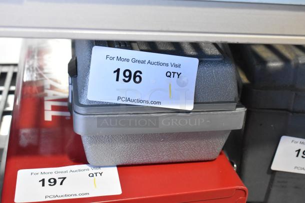 Alt Text: Gray case of Dremel MultiPro Variable Speed Electric Drill with auction label number 196 visible on top.