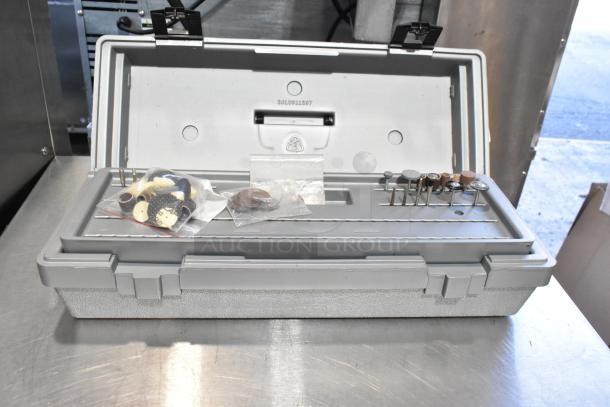 Dremel MultiPro Variable Speed Electric Drill in gray case with assorted bits and accessories, excellent condition.