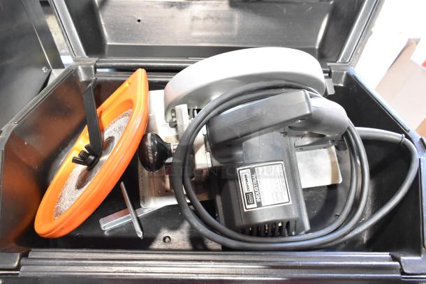 Craftsman 7-1/4" circular saw in tool box. 120 volts, 1 phase. Includes an orange blade guard and power cord in good condition.