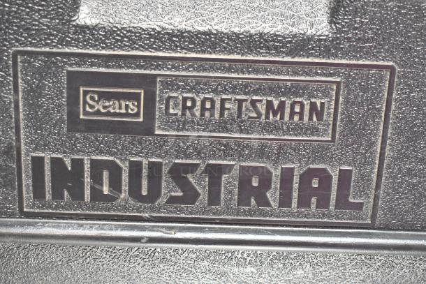 Craftsman 7-1/4" circular saw in tool box. Features 120 volts, 1-phase power. Sears Craftsman Industrial label visible.