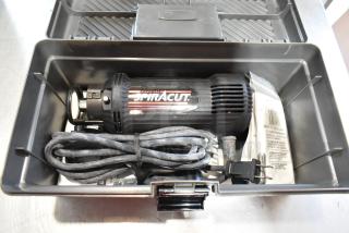 Rotomite Spiracut Electric Drywall Cutter in tool box; 120 volts, 1 phase; includes power cord and manual; well-maintained.