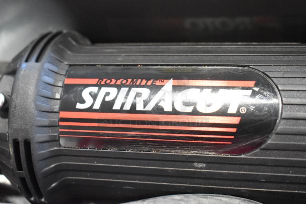 Rotomite Spiracut electric drywall cutter, 120V, in tool box. Features visible branding and good condition.