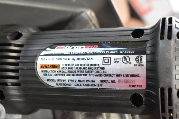 Rotomite Spiracut Electric Drywall Cutter, 120V, 1 Phase. Model RTM 01, made in USA. Warning label visible.