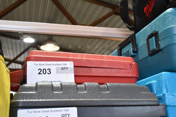 Milwaukee electric heat gun in red hard case. 120 volts, 1 phase. Case labeled with auction number 203.