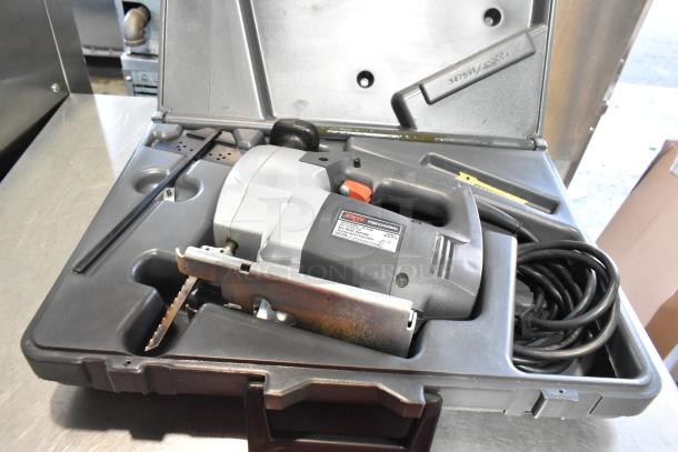 Skil 4650 Auto-scroll Jig Saw in a hard case. 120 Volts, 1 Phase. Includes power cord and extra blades. Good condition.