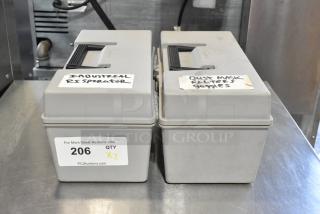Two gray poly tool boxes with contents, including dustmask and safety goggles. Labels read "Industrial Respirator" and "Dust Mask Filters Goggles." Auction lot 206.