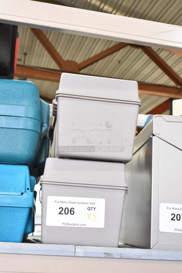 2 gray poly tool boxes with contents, including dust mask and safety goggles. Auction label: 206 QTY x2.
