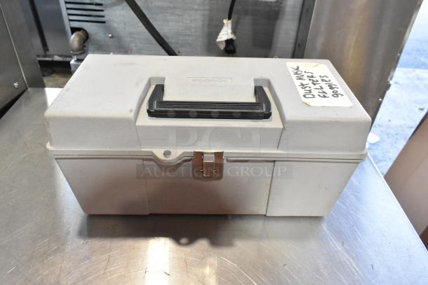 Gray Snap-On tool box with black handle, labeled "Dust Mask, Filter, Goggles." Contains safety gear. Good condition.