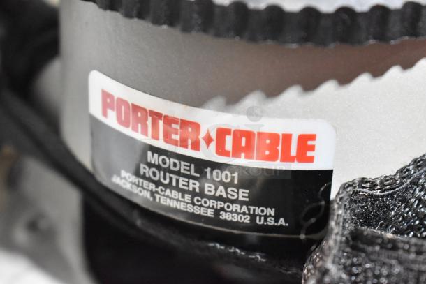 Porter Cable Model 1001 electric router, label visible, 120 volts, housed in gray tool box.