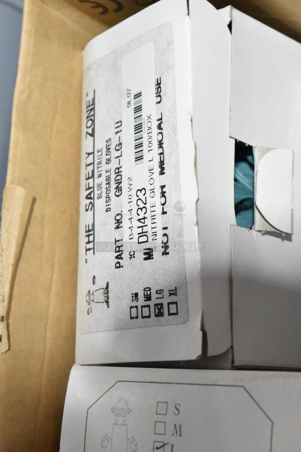 Tier lot including Vornado fan, books, and The Safety Zone blue nitrile gloves. Box marked "100/box, not for medical use."