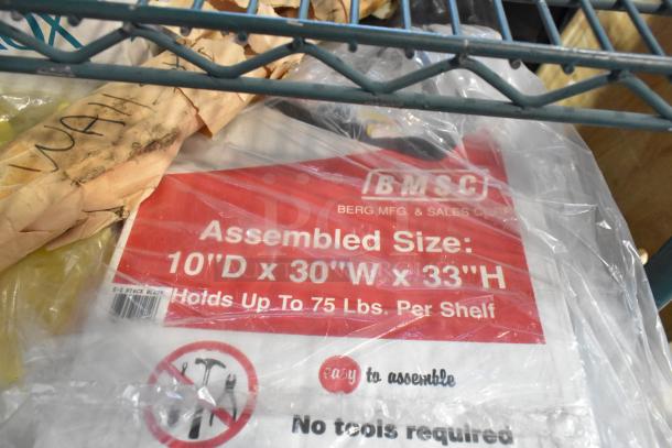 ALL ONE MONEY! tier lot containing a variety of items including a caulk gun, binders, and jumper cables. Label indicates "Berg Mfg. & Sales Corp", shelf size 10"D x 30"W x 33"H, holds up to 75 lbs. per shelf. Easy to assemble, no tools required.