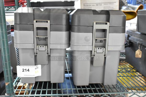 Two Craftsman gray poly toolboxes on a shelf, each with a sturdy latch. Auction tag shows quantity two.