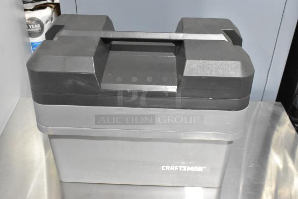Craftsman gray poly tool box, sturdy construction, brand logo visible, excellent condition, stackable design.