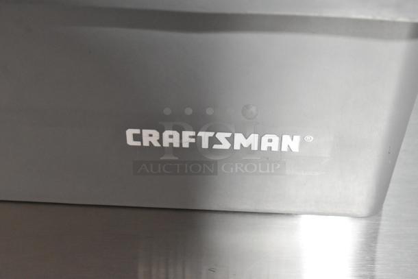 Two Craftsman gray poly tool boxes in excellent condition, featuring durable construction and branded logo on side.