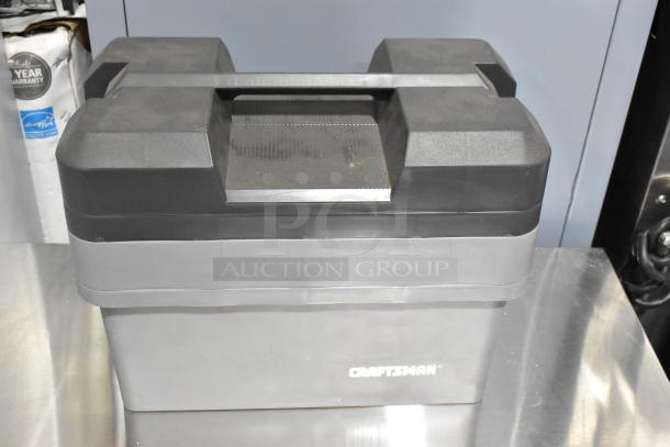 Craftsman gray poly tool box, dual-layer design, sturdy handle, subtle logo, new condition.