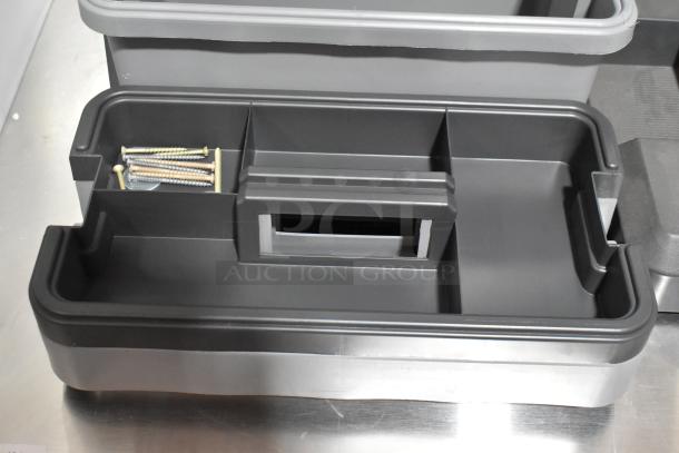 Craftsman gray poly tool box with multiple compartments, visible screws, and durable construction. Excellent condition.