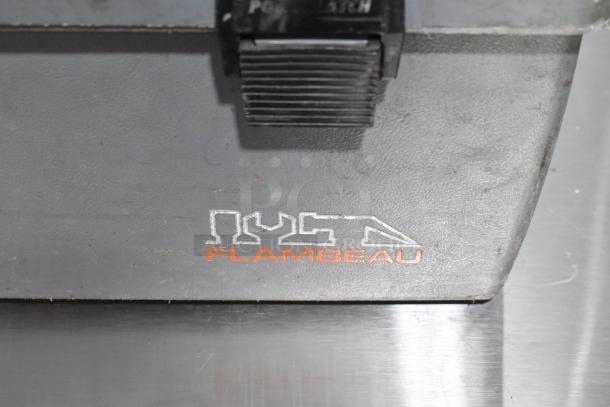 Gray Flambeau poly tool box with latch, featuring logo. Includes Shur Grip, sold as two items. Visible wear.