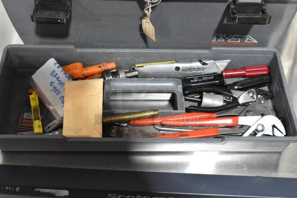 Gray poly tool box with assorted tools, including pliers and screwdrivers. Visible label shows "Shur Grip." Good condition.