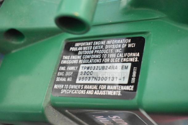 Label on green Poulan Weed Eater engine displaying 32cc displacement, compliance with 1996 California emissions. Serial No. 96037N300131-1.