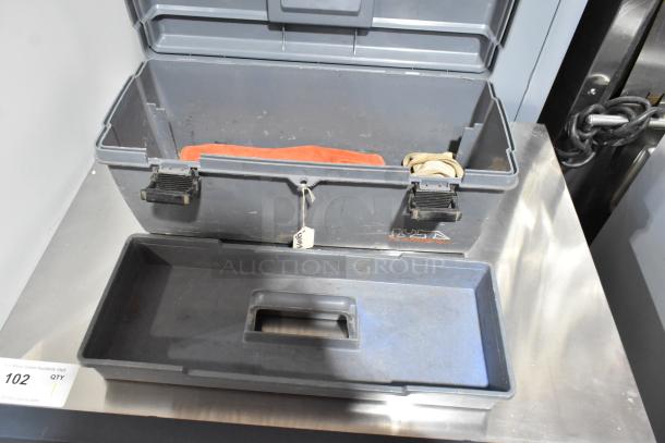 Three gray poly tool boxes with contents, featuring durable latches and interior trays, showing moderate wear.