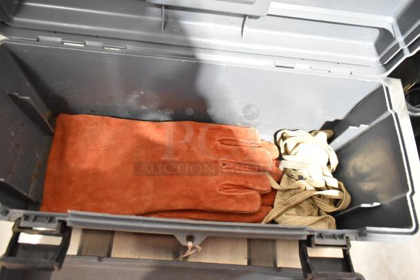 Three gray poly tool boxes with orange gloves and rope inside, showing light wear. Auction item, 3 times your bid.