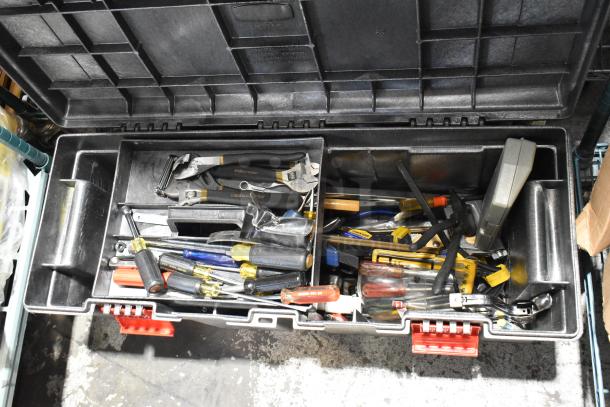 Rubbermaid gray poly tool box with assorted hand tools, including screwdrivers, pliers, and wrenches. Box in good condition.