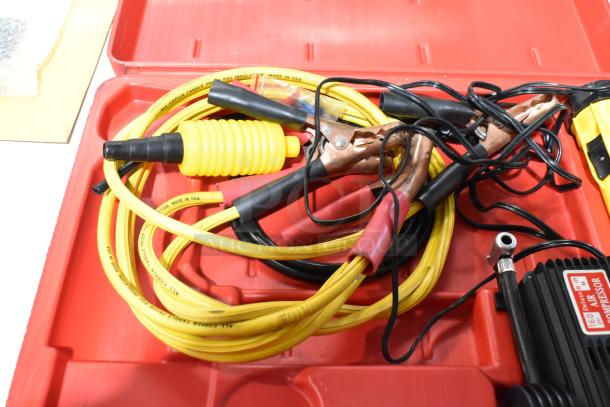 Deluxe Air Compressor in hard case, includes yellow and black cables, copper clamps, labeled "PVC Insulation, Made in USA."