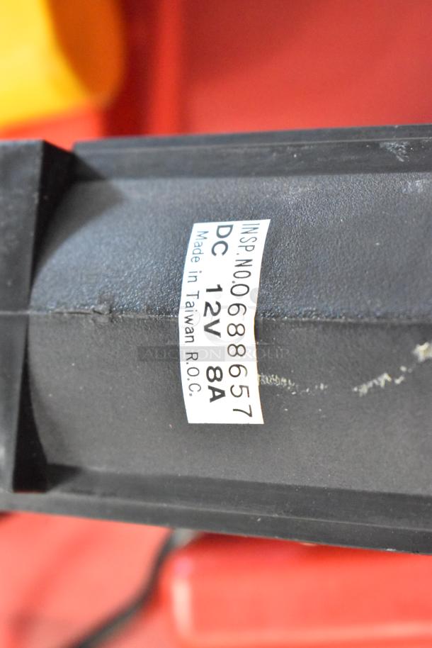 Deluxe air compressor with label "DC 12V 8A, Made in Taiwan R.O.C.," in a hard case, good condition.