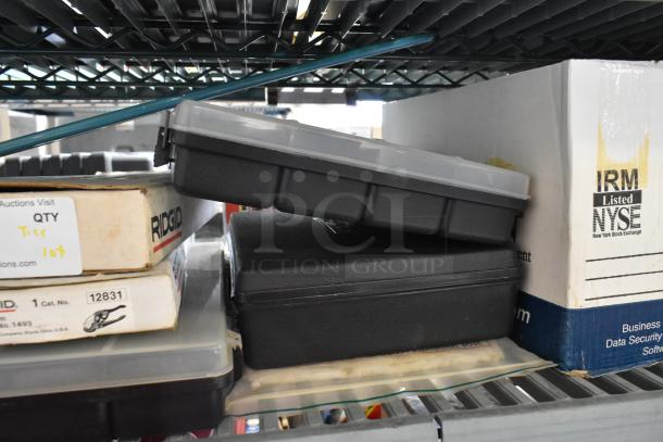 Tiered lot of various items, including a Ridgid 1493 43-60mm tool and poly bins, boxes labeled with item details.