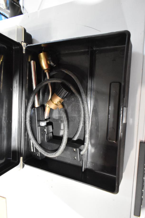 Auction item lot including a Rigid 1493 43-60mm tool with hoses, enclosed in a black case. Good condition.