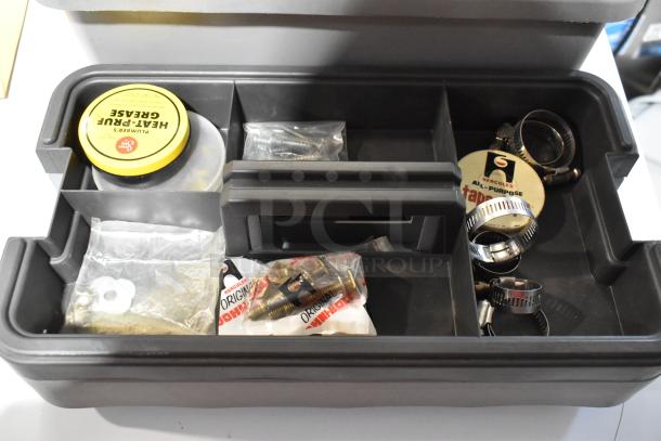 Two gray tool boxes with assorted contents, including screws, clamps, and grease. Good condition, organized compartments.