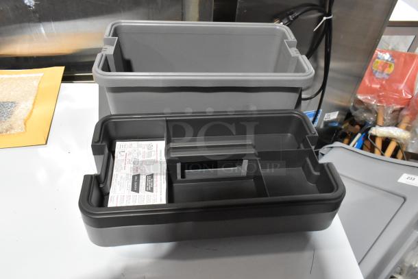 Three Craftsman gray tool boxes with contents, featuring durable plastic construction and compartments. Condition appears excellent.