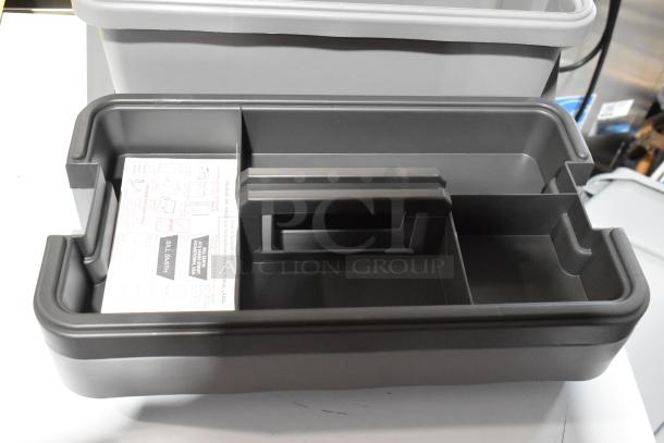 Three Craftsman gray toolboxes with contents; durable plastic, divided compartments, visible label with user instructions.