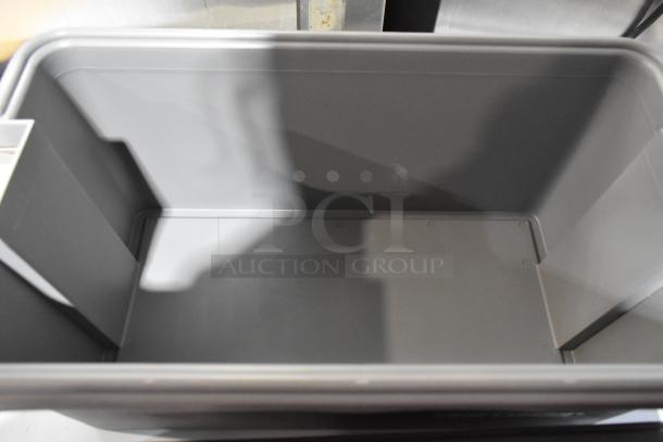 Gray Craftsman tool box, open view, plastic interior, sturdy construction. Auction includes 3 boxes with contents.