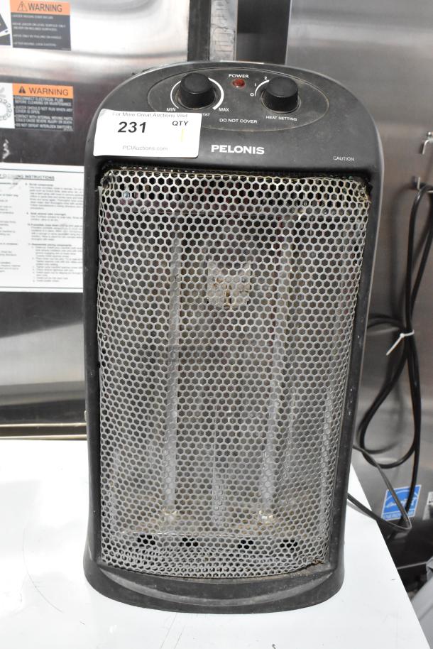 Pelonis HQ-1000B Quartz Heater, 120V, 1 Phase. Features power and heat setting dials. Condition appears used.