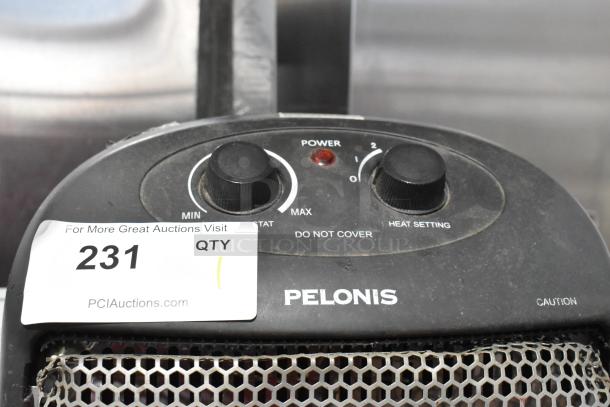 Pelonis HQ-1000B Quartz Heater, 120 Volts, 1 Phase. Features adjustable thermostat and heat settings. Visible caution label.